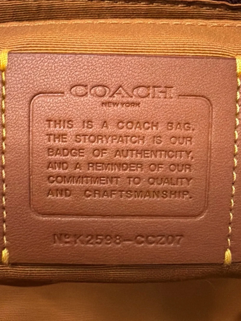 Coach Easton Wine Leather Tote with Gold Accents